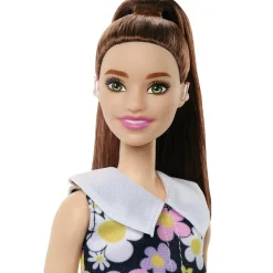 MATTEL Barbie - Muñeca Barbie Fashionista con vestido de margaritas y audífono ㅤ