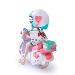 HELLO KITTY - Muñeca Pretty Pink con Scooter